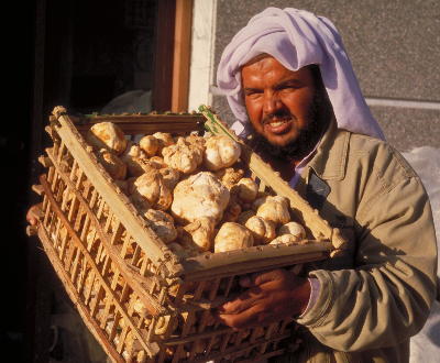 Bedouins trading desert truffles.  photo from Aramco.  used by permission